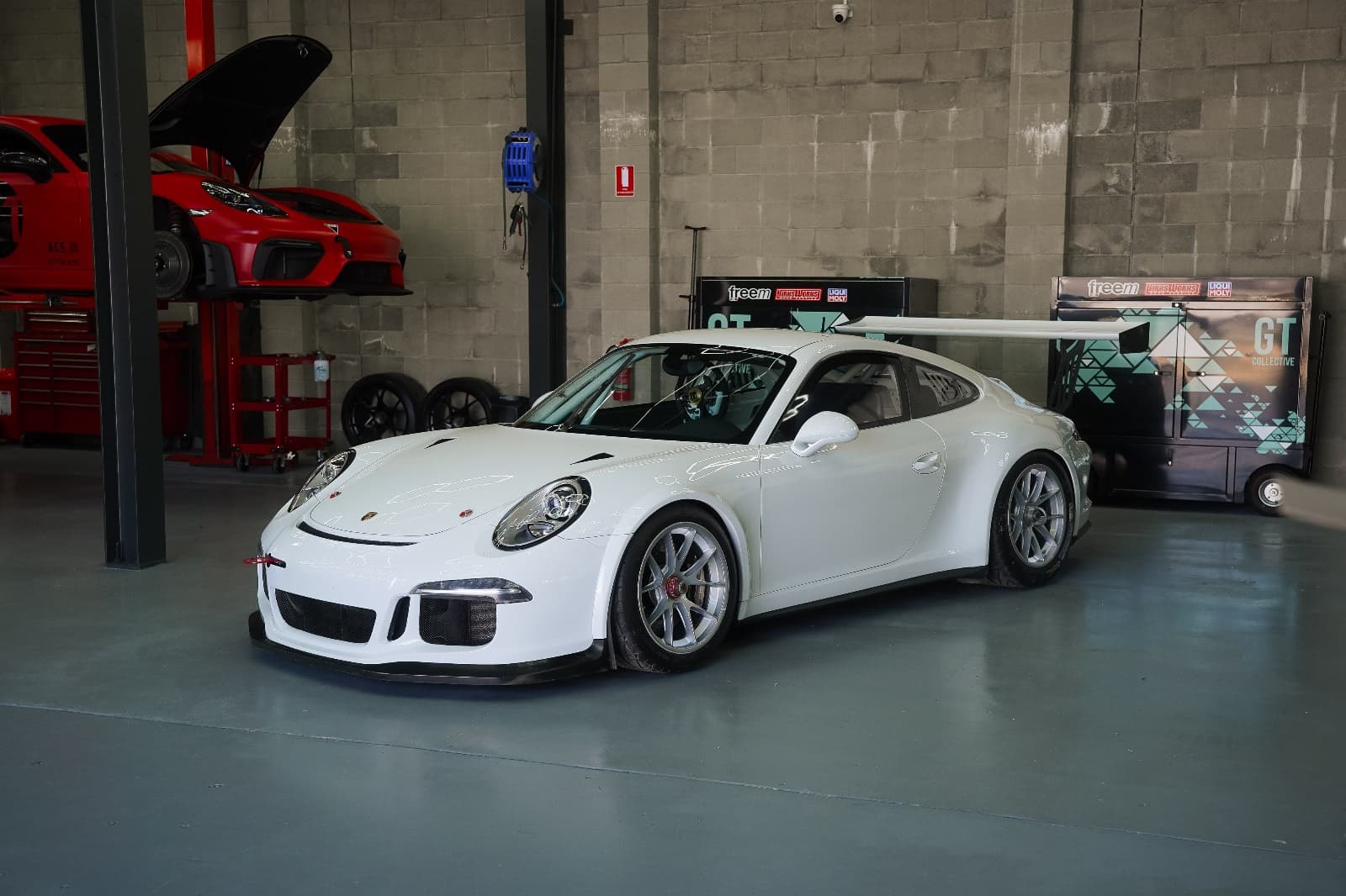 Professional Porsche Motorsport Racing car in a track setting